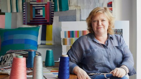 Artist Margo Selby sat in her studio.