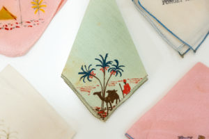 Close up of a wartime painted handkerchief in the Material Memory exhibition