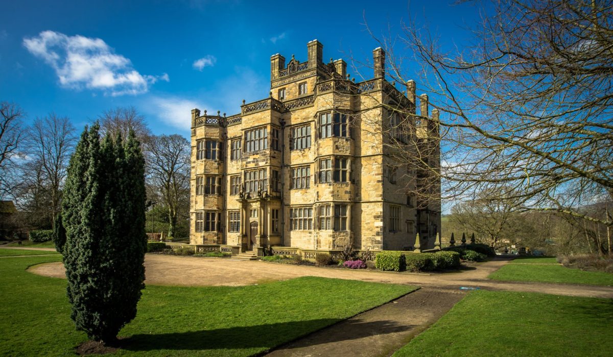 Exterior photo of Gawthorpe Hall on a sunny day