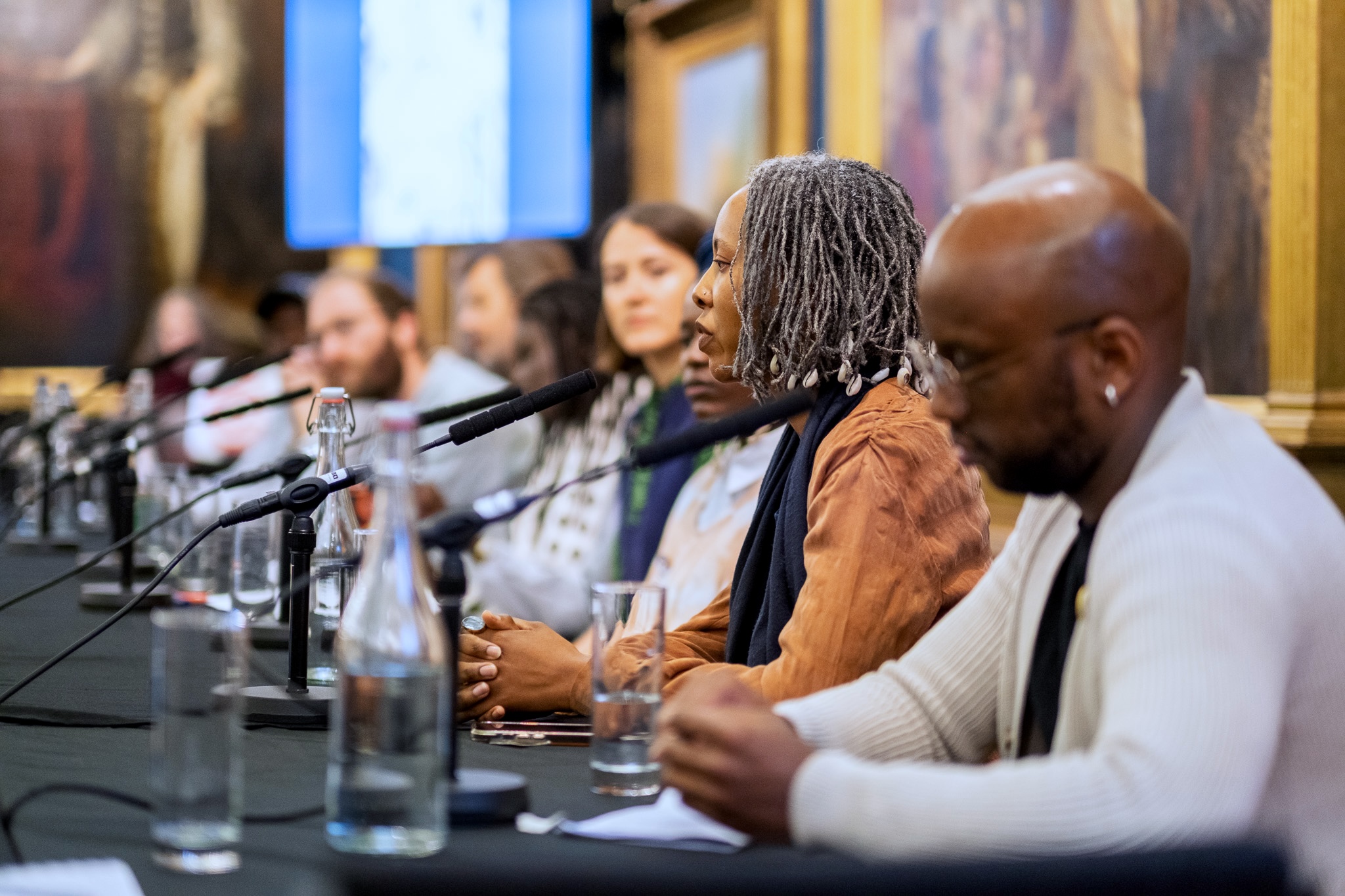 Artist discussing their practice during a Conversation in Creativity event.