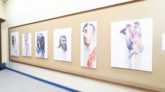 Paintings from The Hoodie Series on display during BTB21